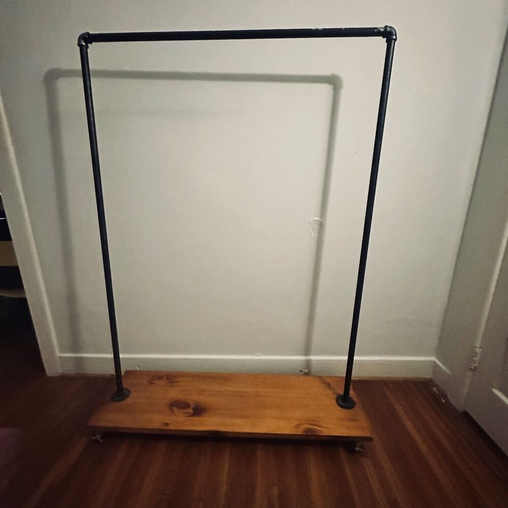 Industrial Black Pipe Rolling Clothing Rack with Wood Base & Casters